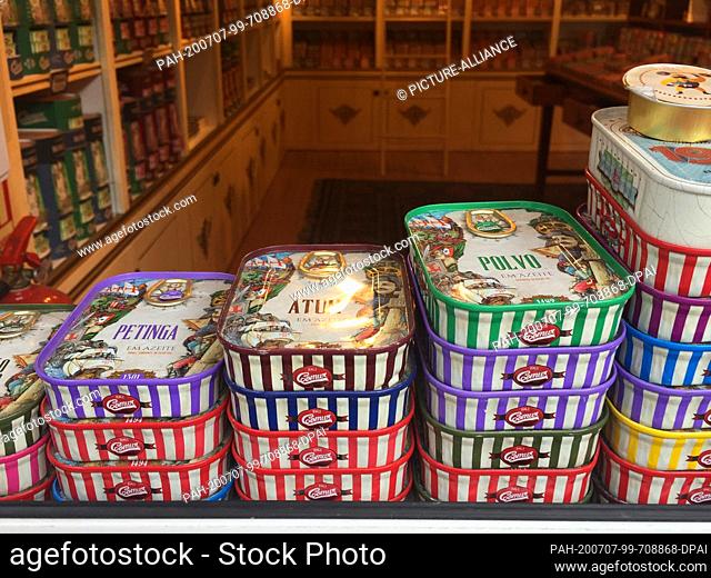 08 August 2019, Portugal, Lissabon: City views Lisbon (Portugal) - Canned fish are in the shop window of a souvenir shop in the Alfama district