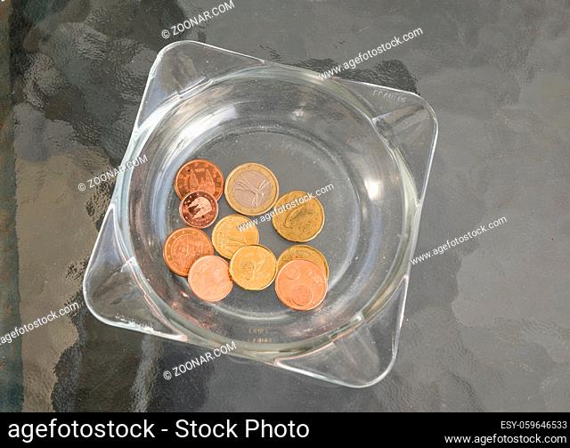 Cafe payment with receipt, Euro notes and coins