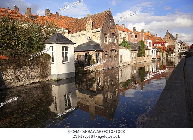 Traditionals houses and their reflections by the canal in the city center, Bruges, West Flanders, Belgium, Europe