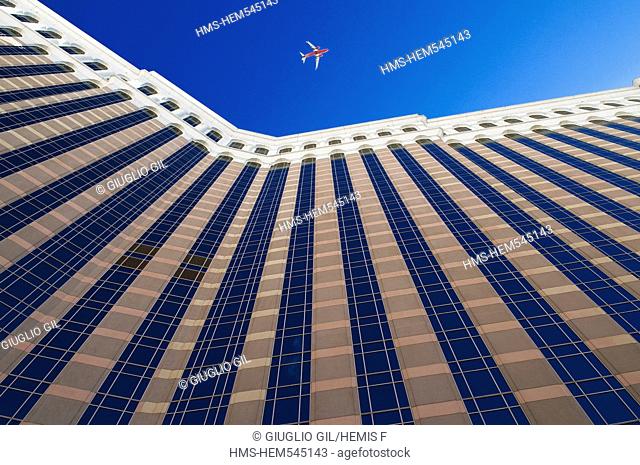 United Statess, Nevada, Las Vegas, The Venetian casino resort hotel and a plane in the sky