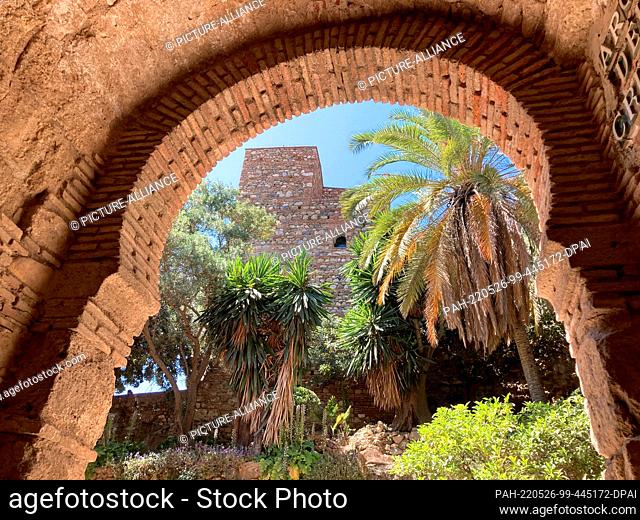 26 May 2022, Spain, Málaga: The Moorish fortress and palace complex Alcazaba, above the city of Malaga. Malaga is located on the Mediterranean Sea on the Costa...