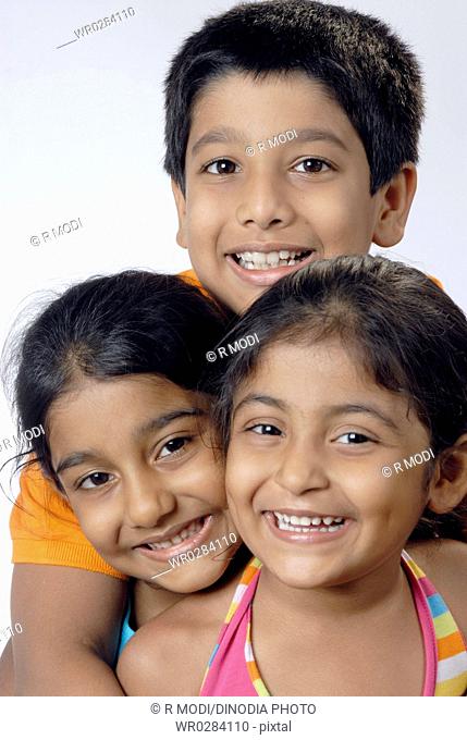 Group of South Asian Indian girls with boy smiling together MR364