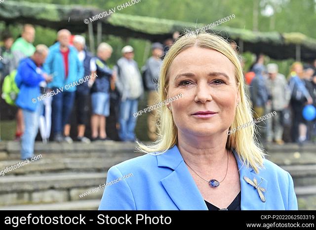 Czech Defence Minister Jana Cernochova speaks with journalists during the Day of Czech military ground forces Bahna 2022 in former military area Brdy u Strasic
