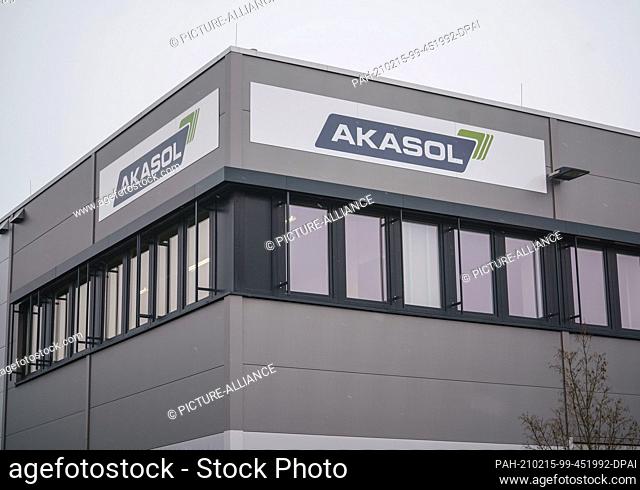 15 February 2021, Hessen, Langen: The Akasol logo is emblazoned on the company's battery plant. US auto supplier BorgWarner wants to buy the company for just...