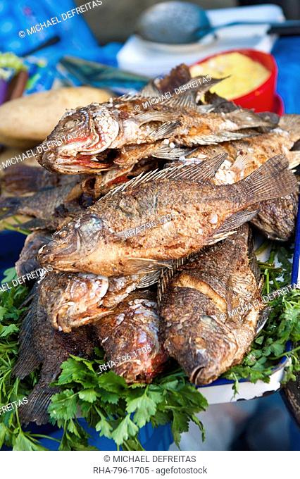 Fried talapia fish in the market at Santiago Sacatepequez, Guatemala, Central America