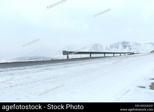 road in winter on snow area plateau