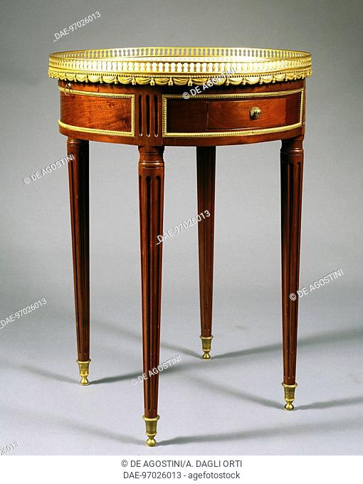 Directoire style mahogany table with white marble top. France, late 18th-early 19th century.  Private Collection