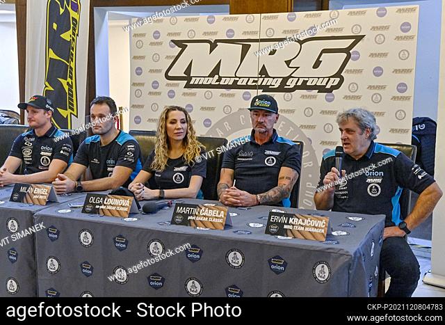 (R-L) Members of the Orion Moto Racing Group team, chief Ervin Krajcovic, car racer Martin Cabela, navigator and singer Olga Lounova and motorcycle racers Milan...