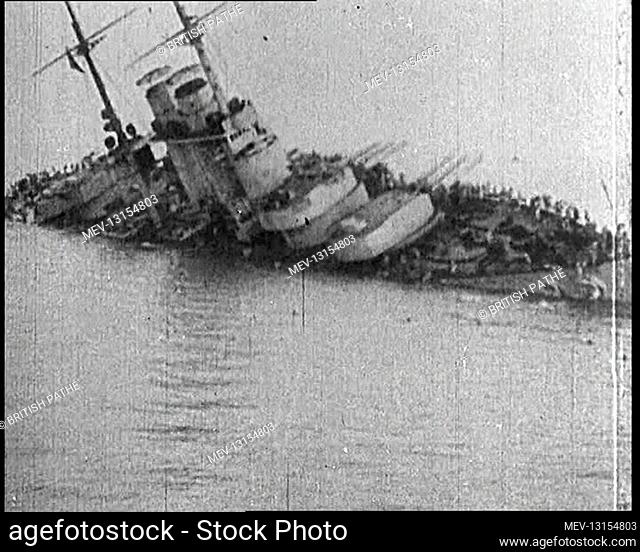 A German Battleship Listing Heavily As It Sinks