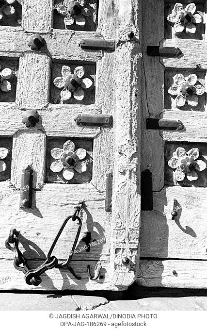 Old wooden door latch Jain temple Jaisalmer Rajasthan India Asia 1984