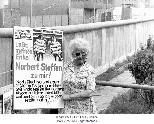 71 year old pensioner Johanna Eckelt protests in front of Berlin Wall in Berlin-Kreuzberg on the 10th of June in 1981 for the release of her grandchild Norbert...