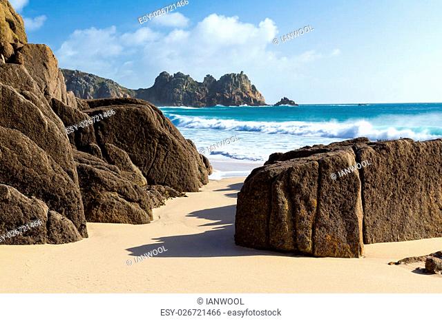 The beautiful golden sandy beach at Porthcurno Cornwall England UK