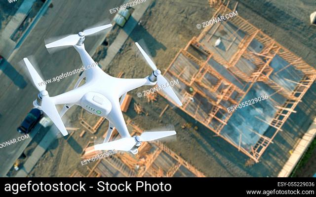 Unmanned Aircraft System (UAV) Quadcopter Drone In The Air Over Construction Site