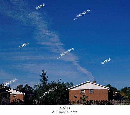Large sky over houses