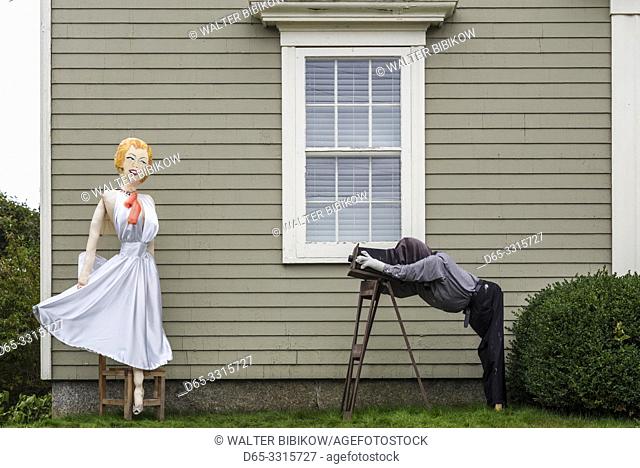 Canada, Nova Scotia, Mahone Bay, Scarecrow Festival, scarecrows in the likeness of a photographer and model