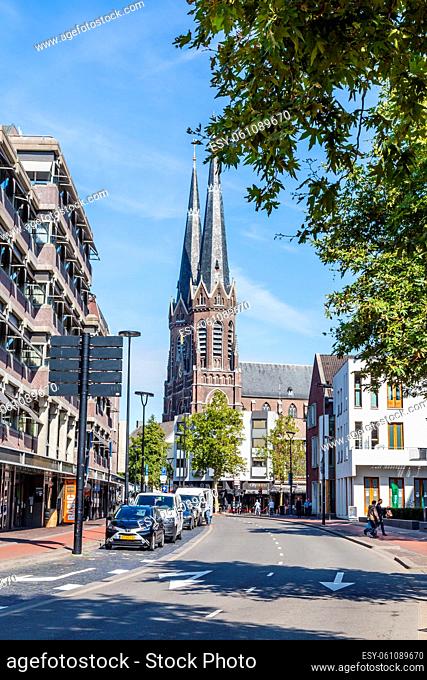 Tilburg Netherlands - September 10, 2019: Streetscene with Saint Joseph Church in the historic centre of Tilburg in Brabant Netherlands