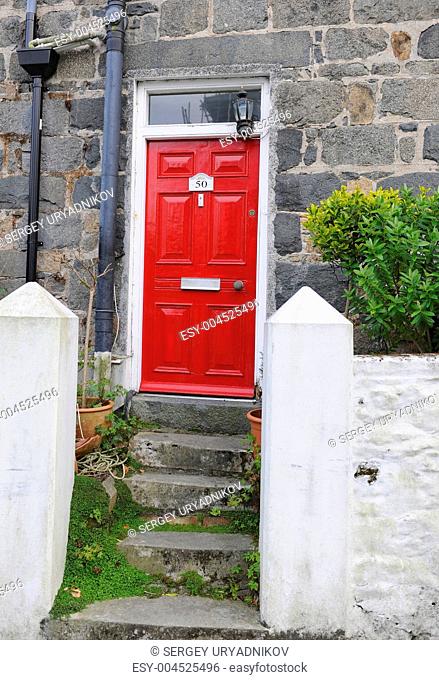 Red door and steps