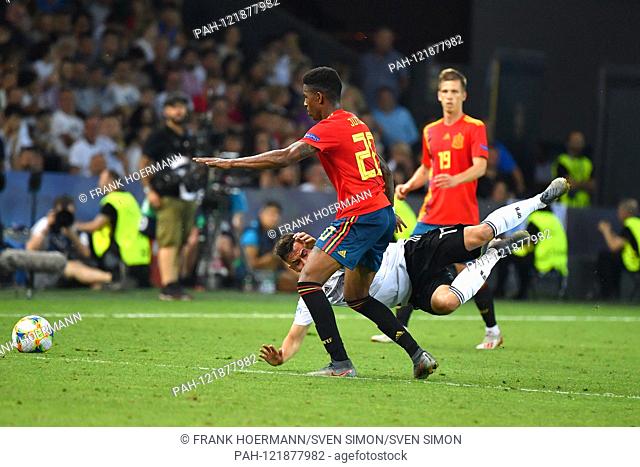 Junior FIRPO (ESP), action, duels versus Marco RICHTER (GER). Spain (ESP) - Germany (GER) 2-1, at 30.06.2019 Stadio Friuli Udine