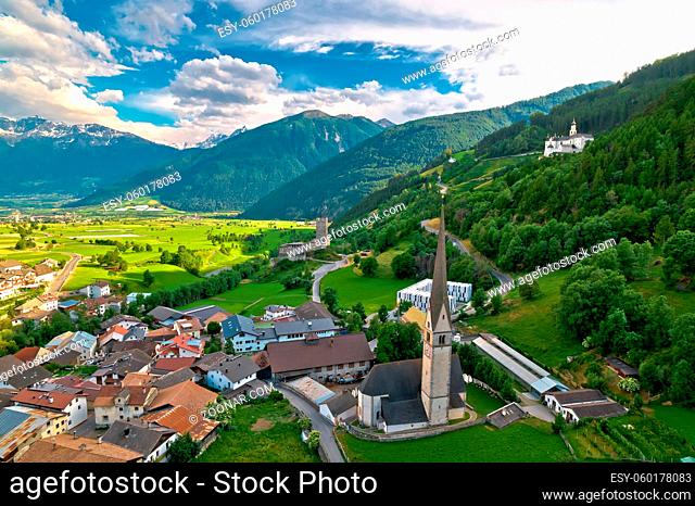 Alpine village of Burgeis and historic castles view, Trentino Alto Adige region of Italy