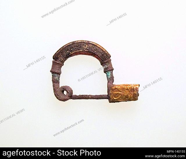 Fibula, bow-shaped. Date: 7th-6th century B.C; Culture: ETRUSCAN; Medium: Silver; Dimensions: Other: 1 1/2 x 3/8 x 2 3/16 in. (3.8 x 0.9 x 5