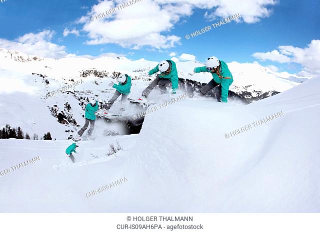 Multi exposure of young woman snowboarding on mountain, Mayrhofen, Tyrol, Austria