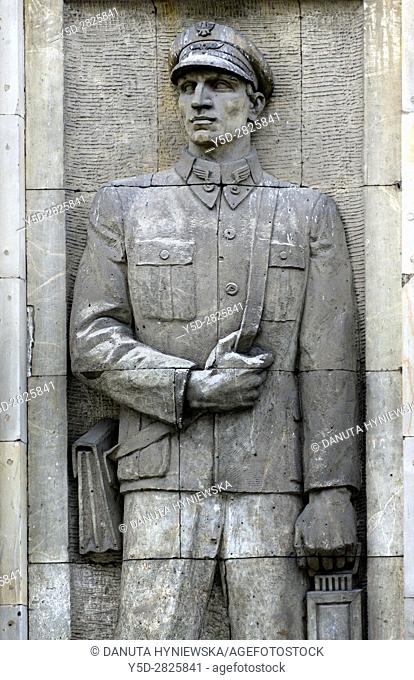 Reminders of communist era, reliefs of heroic workers. here heroic railwayman, Marszalkowska street in Warsaw. Poland