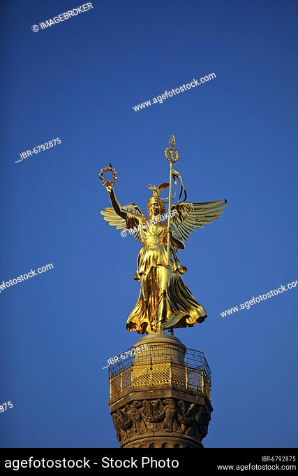 Golden bronze sculpture of Victoria on the Victory Column, inaugurated 1873, artist Friedrich Drake, blue sky, Berlin, Germany, Europe