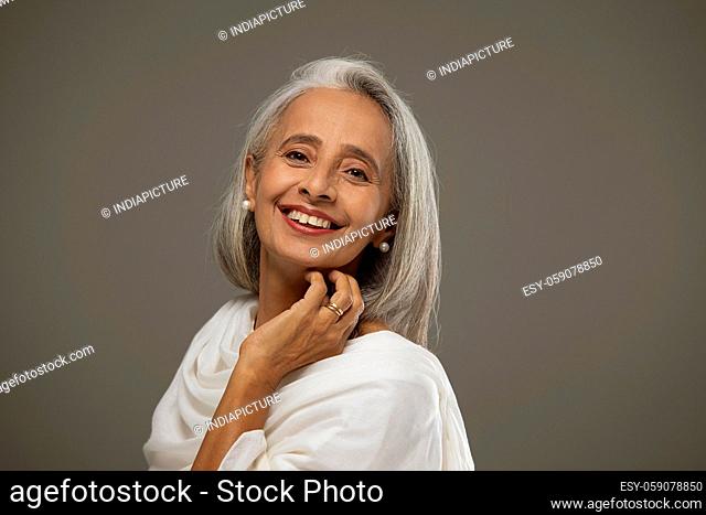 Portrait of old beautiful woman smiling