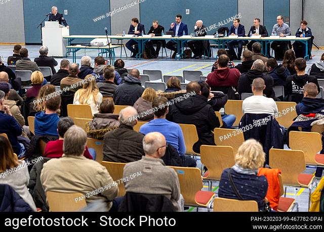 03 February 2023, Mecklenburg-Western Pomerania, Grevesmühlen: Residents of the community of Upahl sit in a gymnasium at the citizens' meeting of the district...
