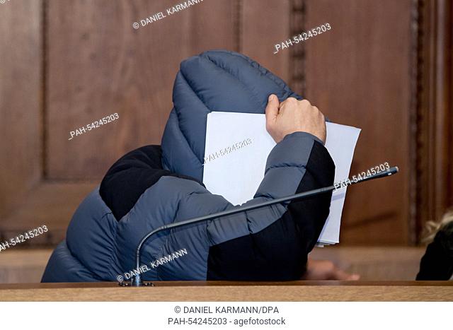 Defendent Ioan F. sits in the courtroom before the start of a trial in the Nuremberg-Fuerth regional court in Nuremberg,  Germany, 10 December 2014