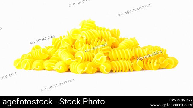 Raw spiral pasta isolated on a white background
