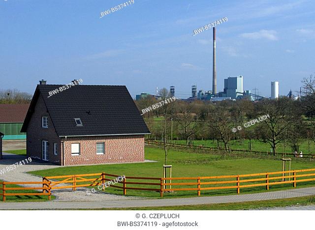 detached house with Walsum power plant in background, Germany, North Rhine-Westphalia, Ruhr Area, Duisburg