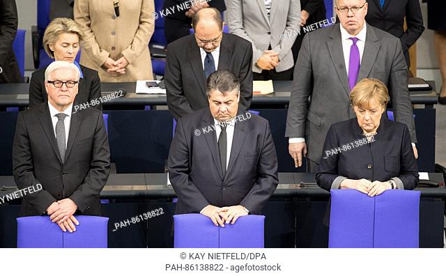 German Foreign Minister Frank-Walter Steinmeier (L-R, front row, SPD), German Economy Minister Sigmar Gabriel (SPD), German Chancellor Angela Merkel (CDU)
