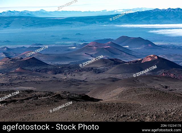 Beautiful volcano landscape of Kamchatka Peninsula: series of cinder cones and lava fields of fissure eruptions Plosky Tolbachik Volcano