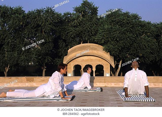 Yoga exercises on the roof, Oberoi Hotel Resort Rajvilas, Jaipur, Rajasthan, India