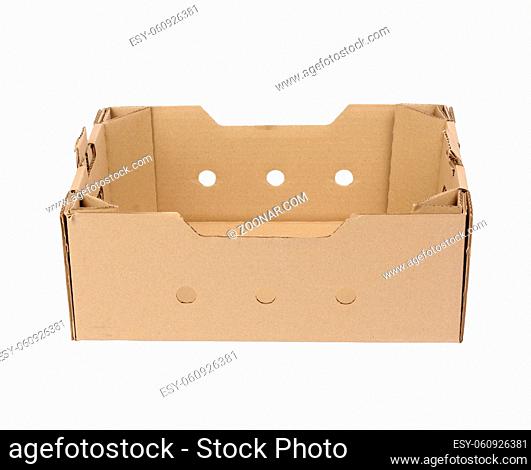 rectangular empty cardboard box of brown paper on a white background, box without a lid for vegetables and fruits in with holes