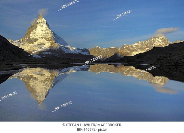 Matterhorn reflected in the Riffelsee, Zermatt, Valais, Switzerland