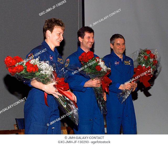 The Expedition Five crewmembers are pictured during their Welcome Home ceremony in the Teague auditorium at Johnson Space Center (JSC)