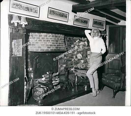 Jan 1, 1950 - 20th Century Diana Dors adds tot the attractions of the 15th century fireplace in the luxurious lounge of her new Sussex home