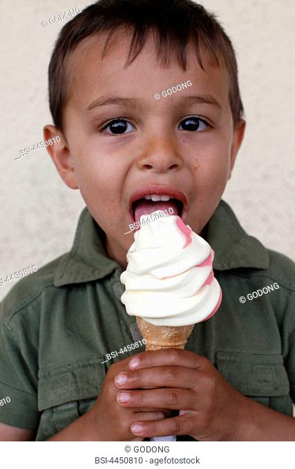 4-year-old boy eating an ice cream
