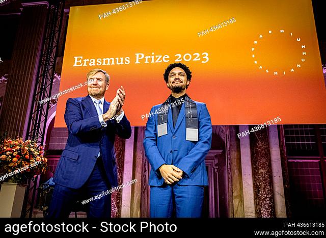 AMSTERDAM, NETHERLANDS - NOVEMBER 28: Comedian Trevor Noah receives the Erasmus Prize presented by King Willem-Alexander of The Netherlands at the Royal Palace...