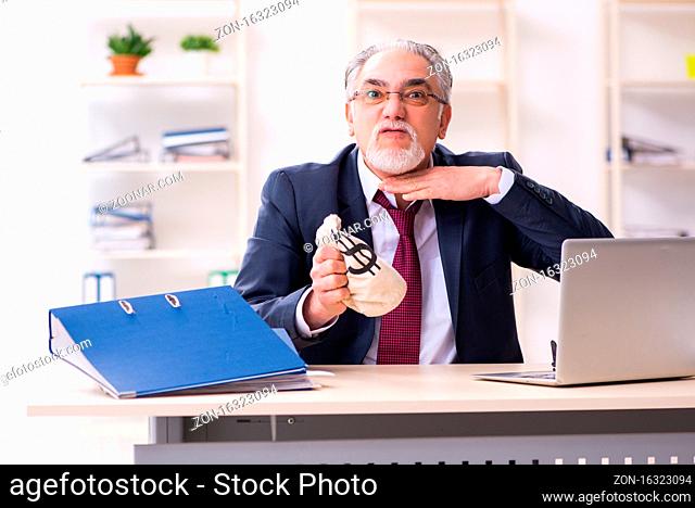 Old businessman in bankruptcy concept