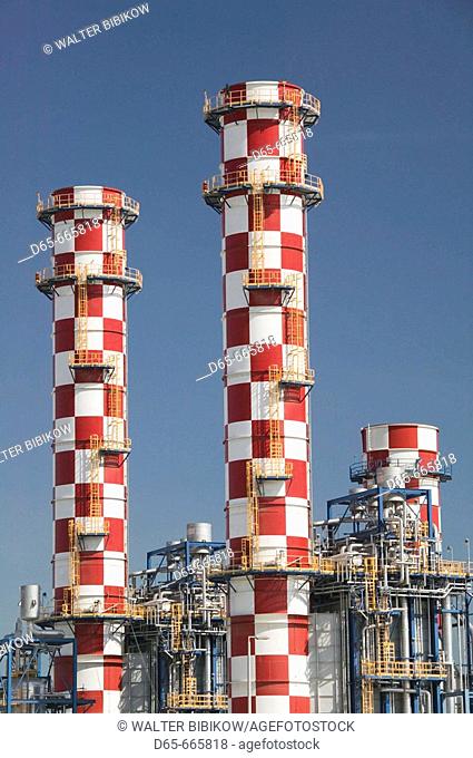 BAHRAIN-Manama/Al Hidd: Chequered Smokestacks / Oil Refinery