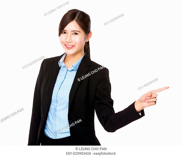 Asian young businesswoman with finger point aside