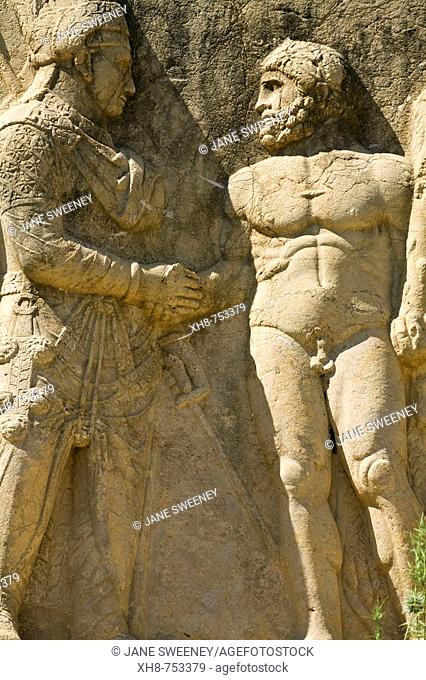 Turkey, Anatolia, Nemrut Dagi National Park, Eski Kale ('Old castle') the ancient Commagene capital of Arsameia, Stone relief of Mithridates I shaking hands...