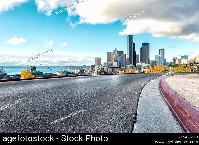 empty asphalt road with cityscape of los angeles
