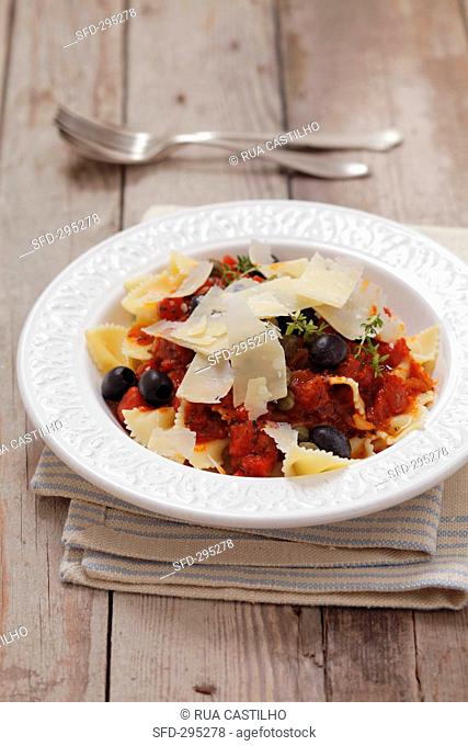 Farfalle with tomato sauce, black olives and Parmesan cheese