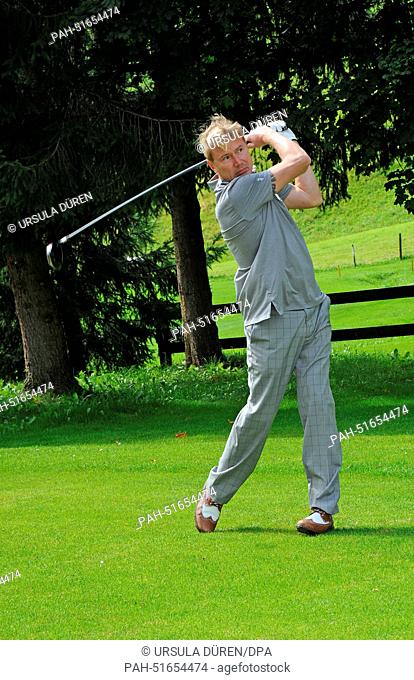 Former Finnish formular one driver Mika Haekkinen plays a round of golf during 'Kaiser Trophy' golf tournament as part of the 'Camp Beckenbauer' event in Reith