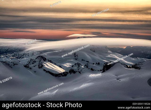 Aerial view from above of White Glacier Mountains. Canadian Nature Background. Located near Squamish and Vancouver, British Columbia, Canada