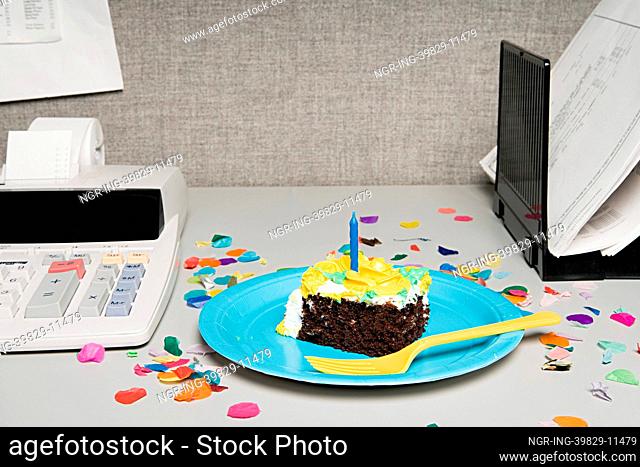 Birthday cake on an office desk